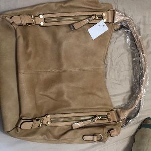 Tan purse. Brand new. Never used